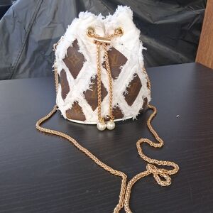 Brown and White Fringe Bucket Crossbody with Gold Chain